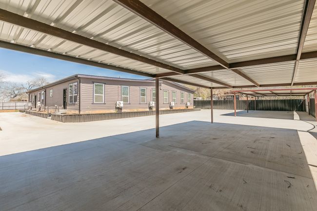 View of patio with fence | Image 17