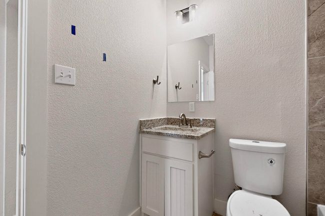 Bathroom with vanity and toilet | Image 24