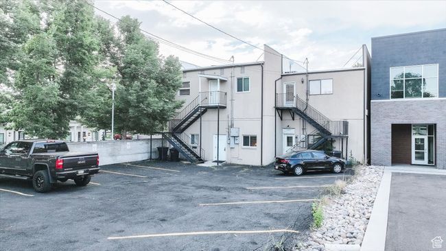 Uncovered parking lot with stairs | Image 24
