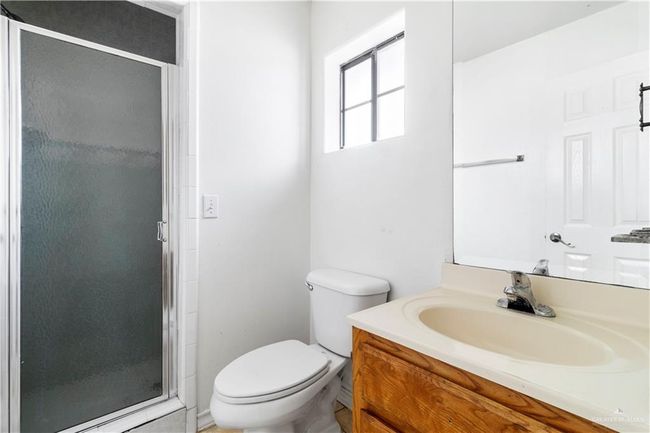 Full bath featuring vanity and a shower stall | Image 16