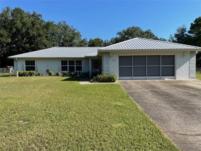 20225 Sw Beach Boulevard, House other with 3 bedrooms, 2 bathrooms and 2 parking in Dunnellon FL | Image 1