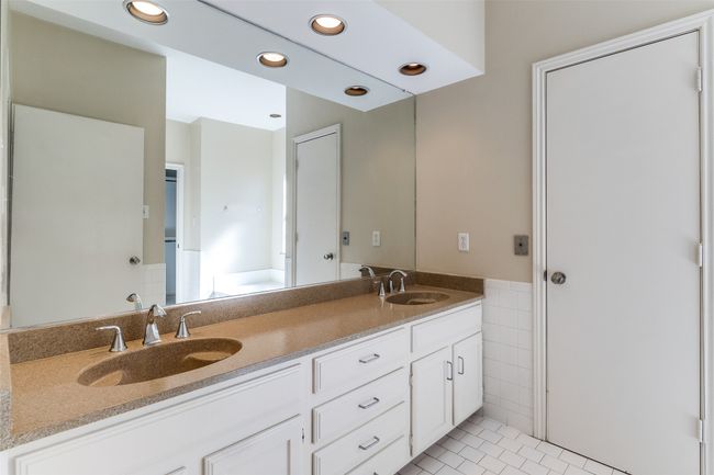 Dual Sinks, Door to walk-in closet | Image 15
