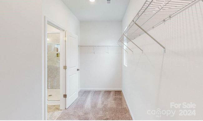 Owners walk-in closet | Image 17
