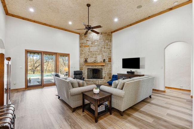 Expansive Living with High Ceilings Overlooks the Sparkling Pool | Image 4