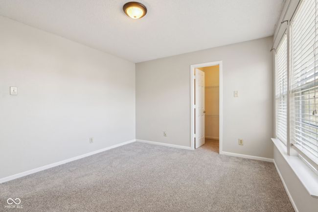 spare room with carpet flooring and baseboards | Image 55