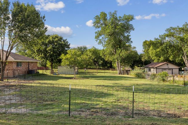 View of yard with an outbuilding and a garage | Image 25