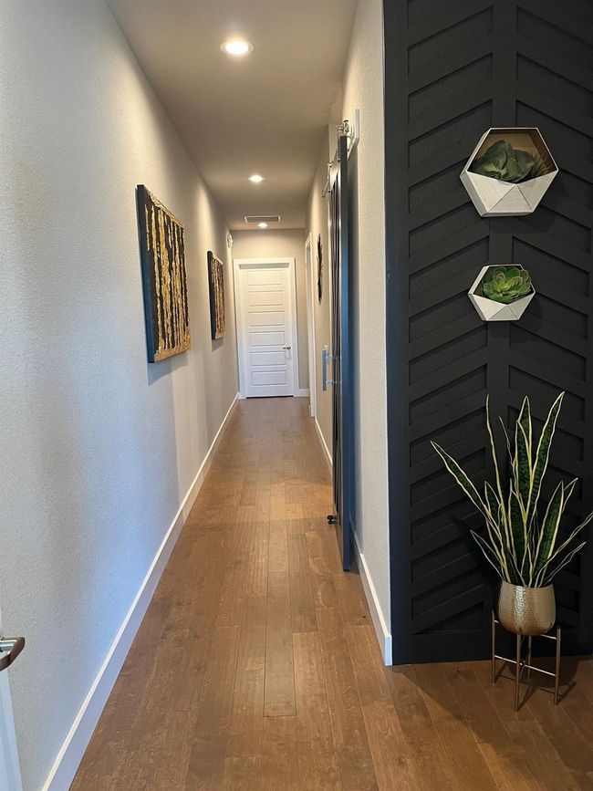 Hallway featuring dark wood finished floors and recessed lighting | Image 18