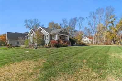 View of home's exterior with front and side yard | Image 3