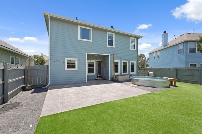 Rear view of property featuring a patio | Image 29
