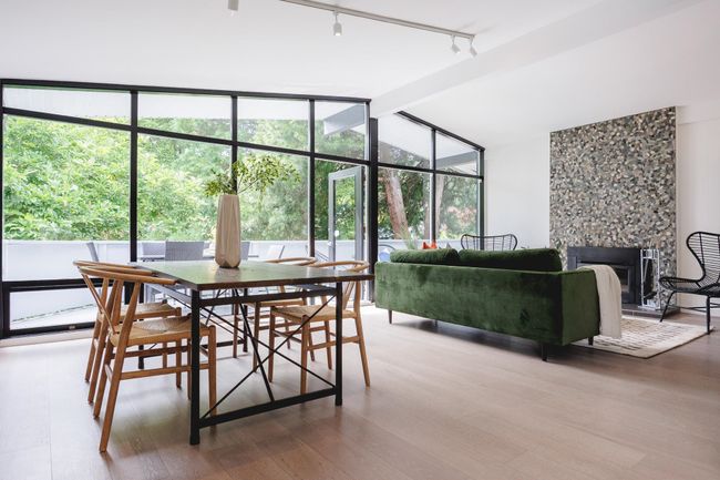 Dining area with track lighting and wood finished floors | Image 6