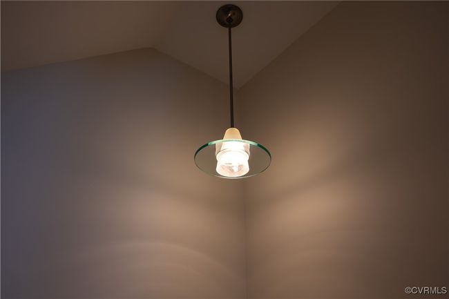 Because it does the job quite nicely, we opted to keep this pendant. It's at the turn of the stair landing. | Image 46