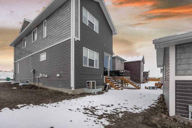 932 Bayview Rise Sw, Home with 4 bedrooms, 3 bathrooms and 2 parking in Airdrie AB | Image 4