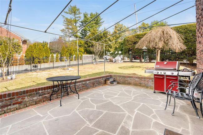 View of patio at the back of the home. | Image 27
