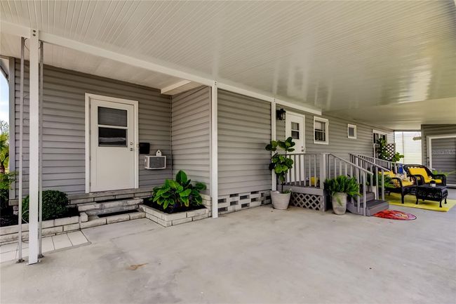 13. x2 Entries.. x1 into Bonus Room, Other Into Kitchen & Dining Area. | Image 13