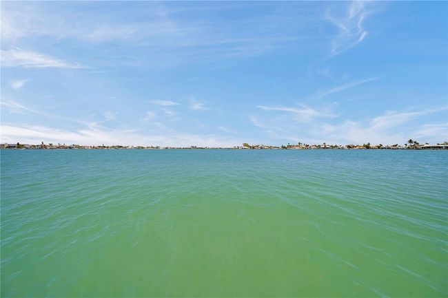 This is no canal lot - here you have wide open water views across Boca Ciega Bay. | Image 12