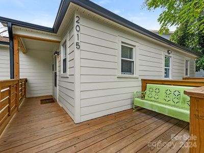 Private wrap around porch at covered 2015 Pinckney entry. | Image 1