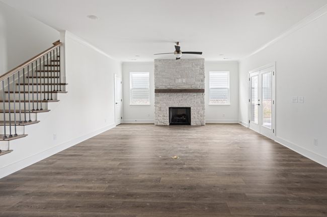 Living room area has lots of wall space for different arrangements of furniture placement | Image 9
