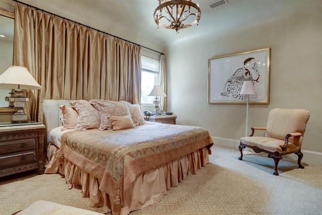 First bedroom on second floor has great space, chandelier, walk in closet and bathroom. | Image 29