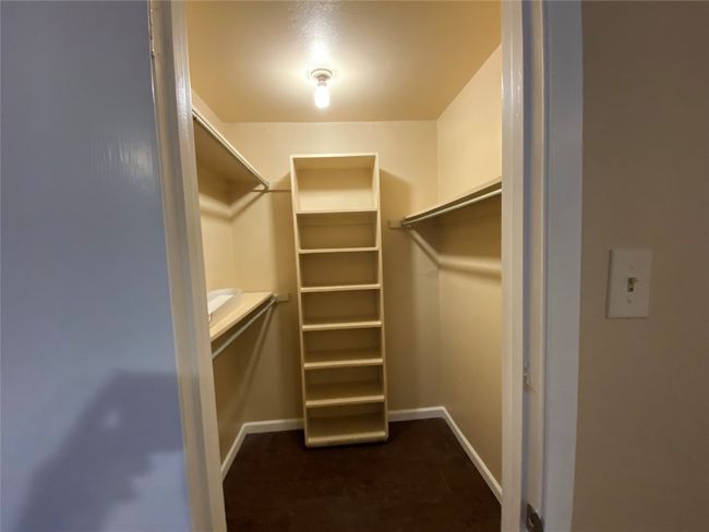 View of spacious closet | Image 13
