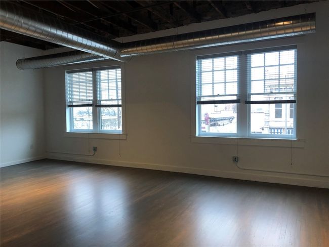 O;en concept Loft with dark wood flooring | Image 4
