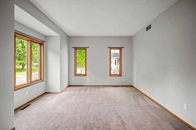 On the other side of the front door is your front room! Great for those needing an office space while working from home. Carpet has been professionally cleaned May 2025. | Image 4
