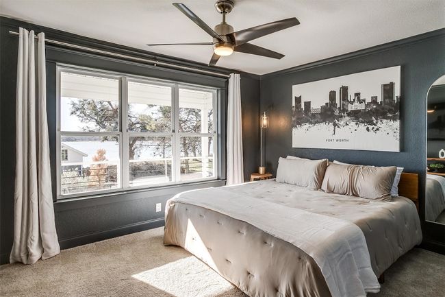 Bedroom featuring carpet flooring, crown molding, and ceiling fan | Image 19