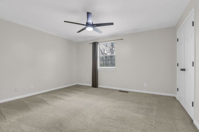 One of the two bedrooms upstairs. | Image 13