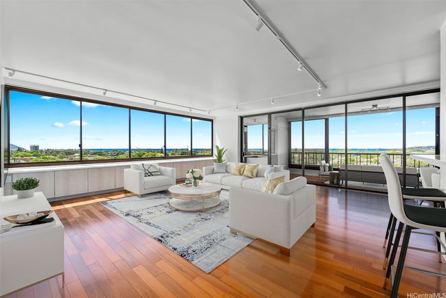 UNOBSTRUCTED views from Koko Head to Diamond Head! Notice all of the cabinet space under the windows. Also, UV protected automated blinds are featured throughout the unit. Virtually Staged(enhanced) | Image 5