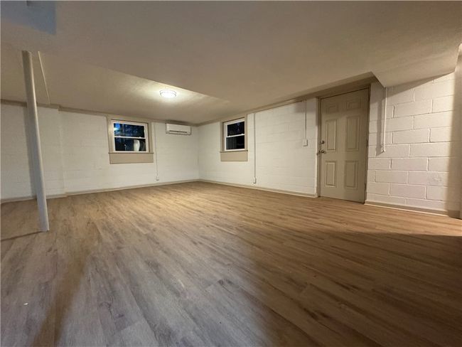 Downstairs is massive - two rooms - one room goes outside to the yard and great patio/grill space. | Image 17