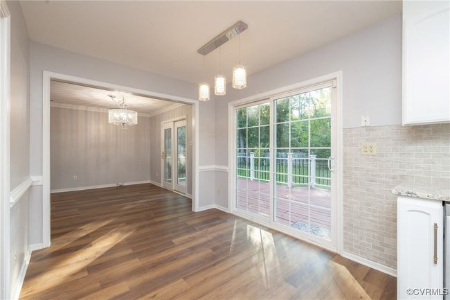 Breakfast nook w/ sliding door to back deck | Image 11
