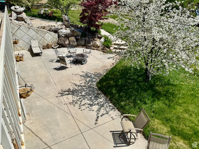 View of patio with a fire pit | Image 23