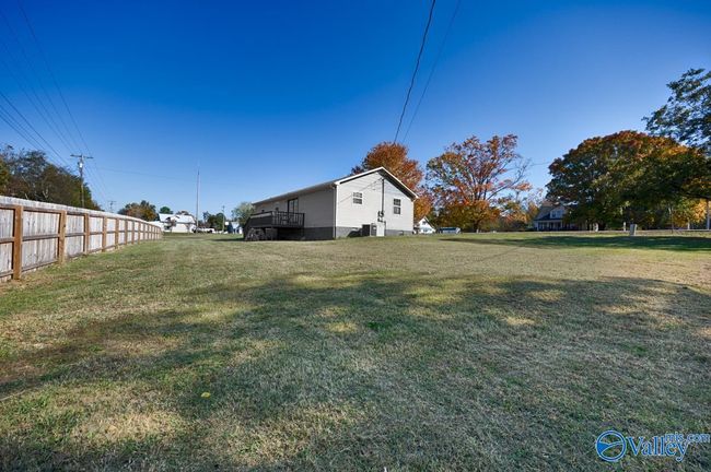 Large yard with some shade | Image 6
