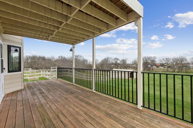 Wooden deck featuring a lawn | Image 31