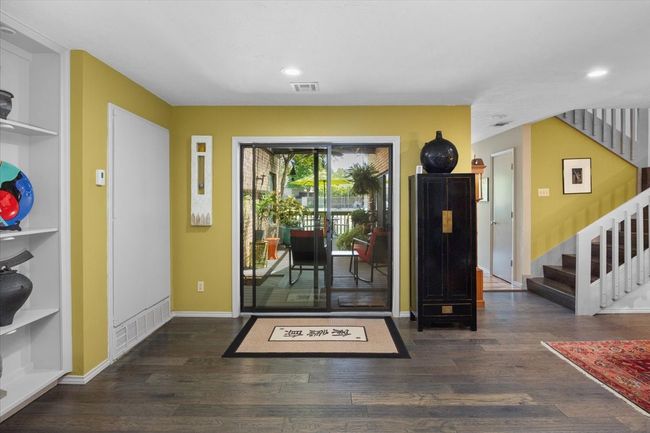 Extra space with sliding doors featuring patio in back. | Image 17