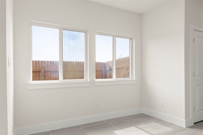 Unfurnished room with baseboards | Image 11