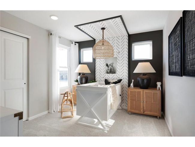 The Ashton also features two large guest bedrooms perfect for any use! Photo of model home. | Image 34