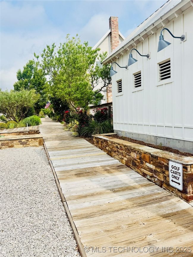 55 Boardwalk is just steps away from pool | Image 54