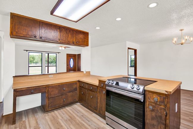 Spacious kitchen with lots of counter space. | Image 10