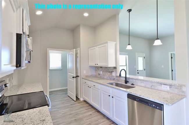This image of another completed home, same builder, same floor plan. | Image 6