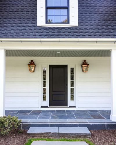 Property entrance with a porch | Image 2