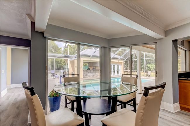 Breakfast nook overlooking pool | Image 11