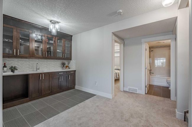 24 Bayside Link Sw, Home with 4 bedrooms, 3 bathrooms and 5 parking in Airdrie AB | Image 31