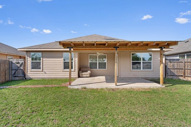 Rear view of house featuring a patio and a ceiling fan | Image 27