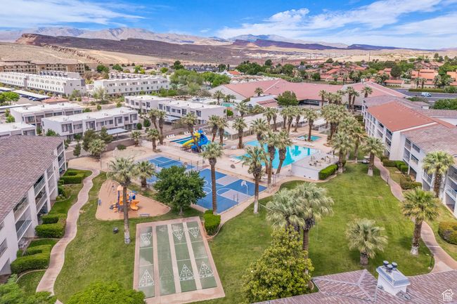 Aerial view of a mountain backdrop and a pool area | Image 30