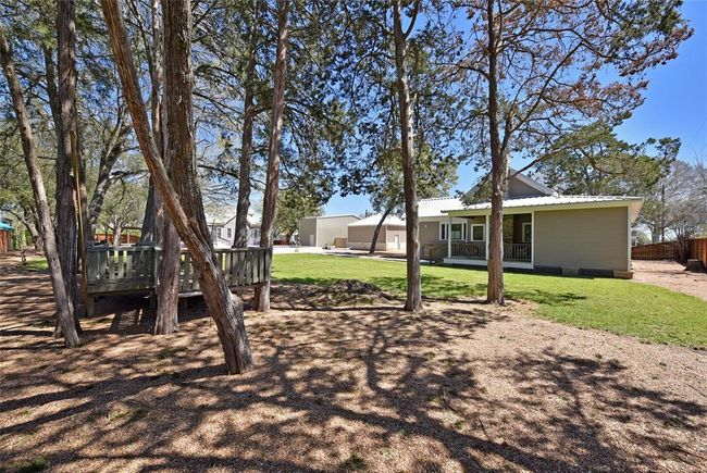 This is just a fun little area for the kids, behind the guest house. Your family will love this place! | Image 49