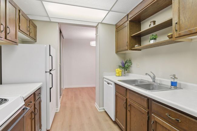 The updated LVP flooring adds the modern feel of the unit. | Image 5