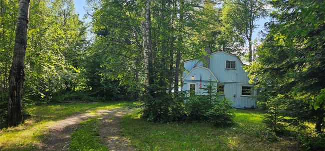 View of yard with driveway | Image 11