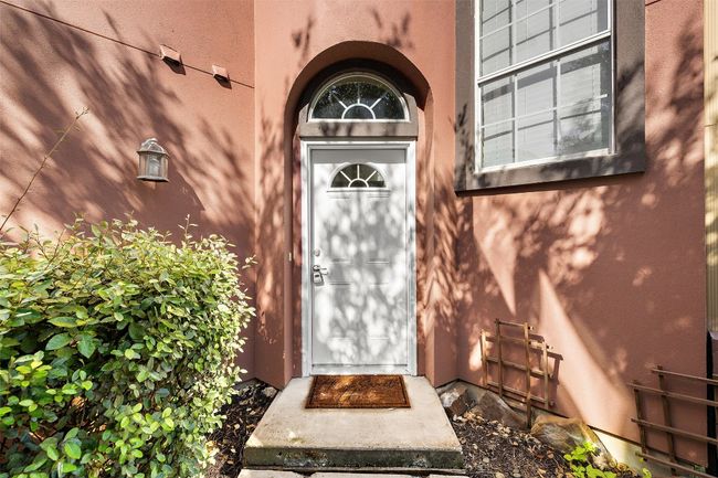 Property entrance featuring stucco siding | Image 7