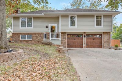 Raised ranch featuring a garage | Image 1