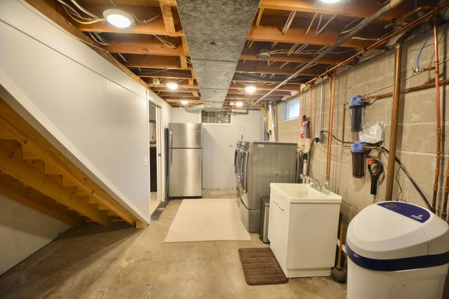 Unfinished Side of Basement with Landry | Image 29
